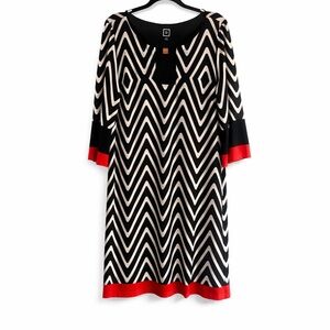 Chic Black and White Chevron Dress with Red Accents
